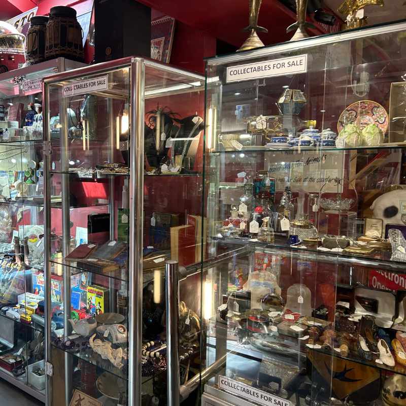 Antiques for sale in glass cabinets
