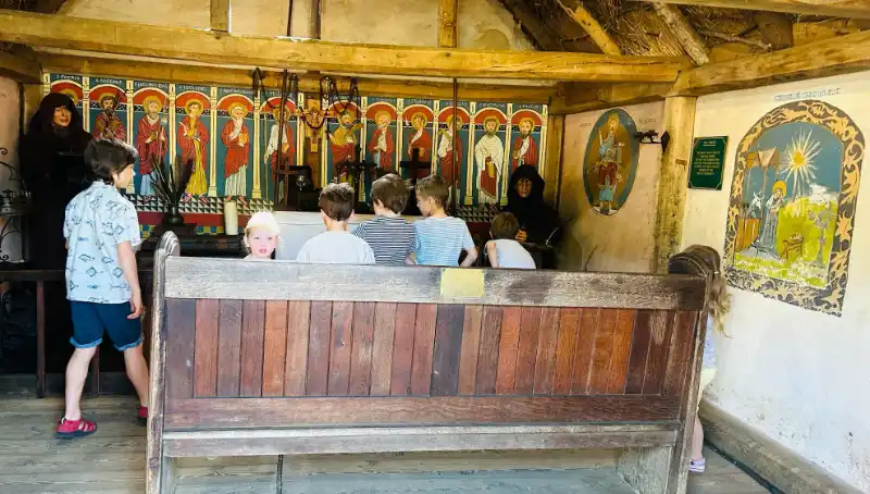 Children in the Church building at Mountfitchet Castle